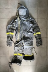 Rubber hazmat one piece suit with included gas mask. Sz XL